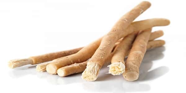 What is the interpretation of a dream about a siwak for a divorced woman according to Ibn Sirin?